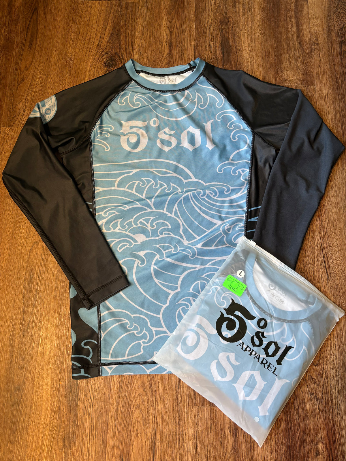 Be Water  Rash Guard
