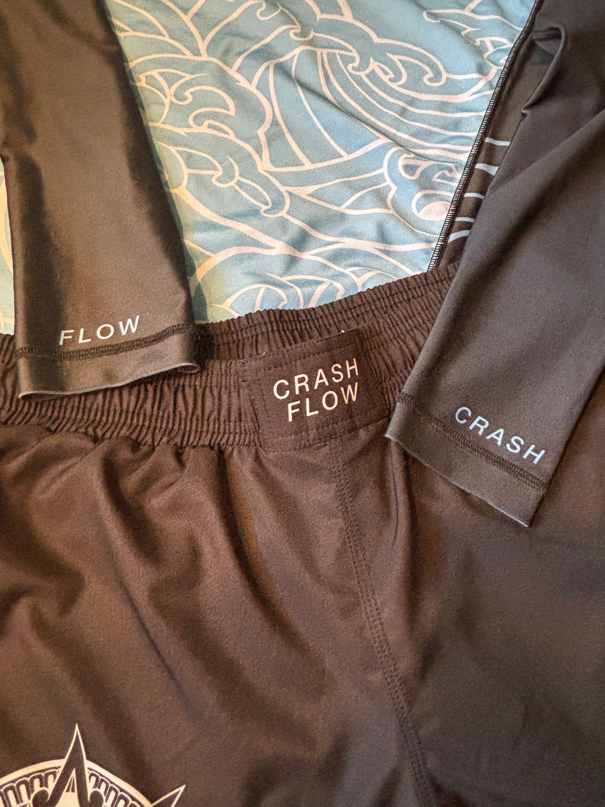 Be Water  Rash Guard